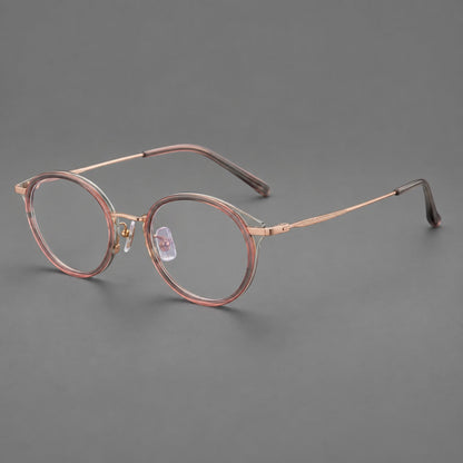 Retro panto eyeglasses in acetate and titanium with an arched bridge and engraved metal temples in Patterned Pink / Rose Gold, three quarter view front view