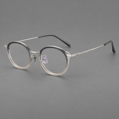 Retro panto eyeglasses in acetate and titanium with an arched bridge and engraved metal temples in Gray Green Gradient / Silver, three quarter view lens detail