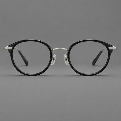 Retro panto eyeglasses in acetate and titanium with an arched bridge and engraved metal temples in Glossy Black / Matte Gunmetal, front view additional product view