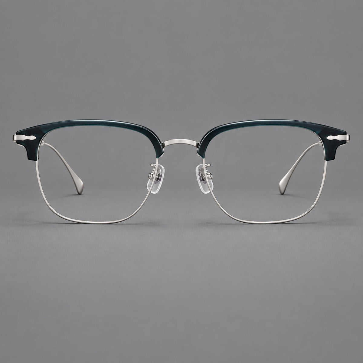 Browline eyeglasses in acetate and titanium with slim metal lower rims and decorative corners in Peacock Blue / Silver, front view