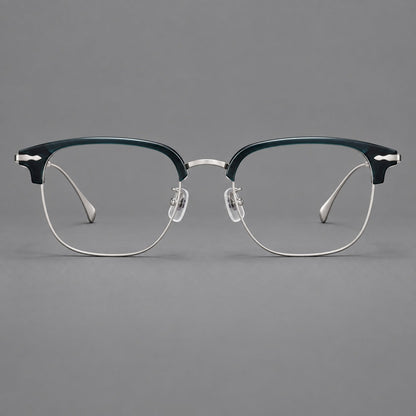 Browline eyeglasses in acetate and titanium with slim metal lower rims and decorative corners in Peacock Blue / Silver, front view frame detail