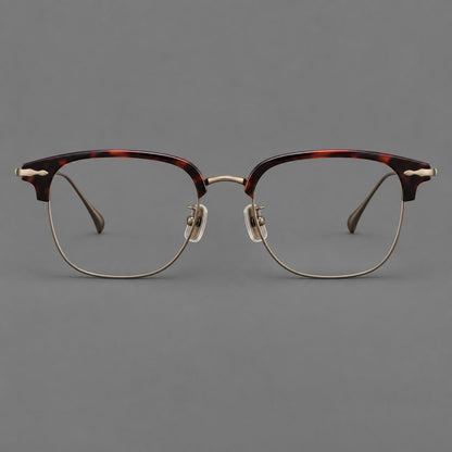 Browline eyeglasses in acetate and titanium with slim metal lower rims and decorative corners in Red Tortoiseshell / Antique Bronze, front view temple detail