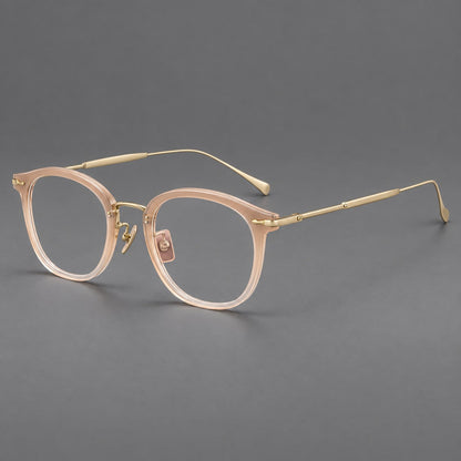 Panto eyeglasses in acetate and titanium with curved brows and decorative metal corner accents in Nude Pink / Gold, three quarter view