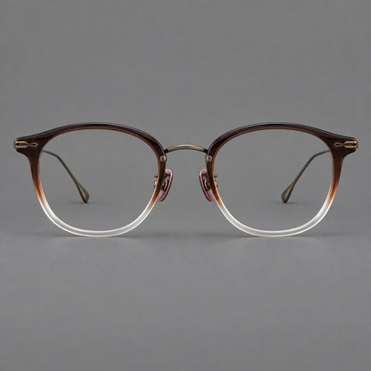 Panto eyeglasses in acetate and titanium with curved brows and decorative metal corner accents in Tea Brown Gradient / Antique Bronze, front view temple detail