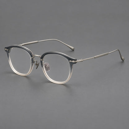 Panto eyeglasses in acetate and titanium with curved brows and decorative metal corner accents in Ice Blue Tea / Silver, three quarter view additional product view