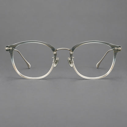 Panto eyeglasses in acetate and titanium with curved brows and decorative metal corner accents in Ice Blue Tea / Silver, front view additional product view