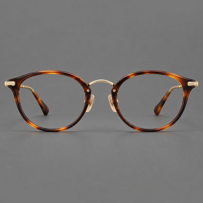 Vintage panto eyeglasses in acetate and titanium with raised brows and textured metal temples in Tortoiseshell / Gold, front view side view