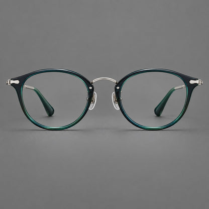 Vintage panto eyeglasses in acetate and titanium with raised brows and textured metal temples in Peacock Blue / Silver, front view frame detail