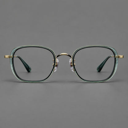Rounded square eyeglasses in acetate and titanium with an arched bridge and engraved temples in Misted Clear Green / Antique Gold, front view frame detail