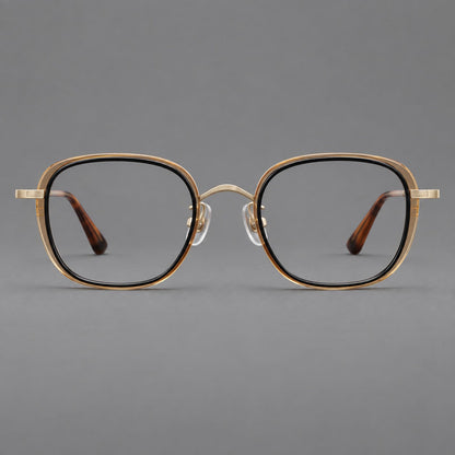 Rounded square eyeglasses in acetate and titanium with an arched bridge and engraved temples in Black and Clear Tea / Light Gold, front view temple detail