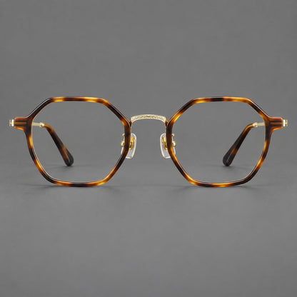Geometric eyeglasses in acetate and titanium with octagonal rims and a textured metal bridge in Amber Tortoiseshell / Light Gold, front view side view
