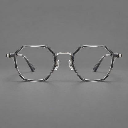 Geometric eyeglasses in acetate and titanium with octagonal rims and a textured metal bridge in Clear Mist Gray / Silver, front view frame detail
