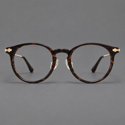 Retro acetate and titanium eyeglasses with round rims and a pronounced keyhole bridge in Brown Woodgrain / Gold, front view side view