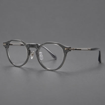 Retro acetate and titanium eyeglasses with round rims and distinctive looped metal joints in Clear Gray / Brushed Gray, three quarter view lens detail
