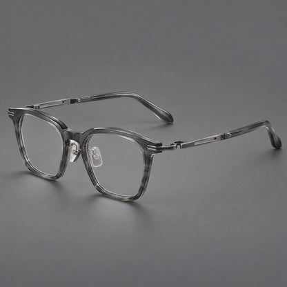 Acetate and titanium eyeglasses with rounded rectangular rims and sculpted open loop joints in Clear Gray / Brushed Gray, three quarter view lens detail