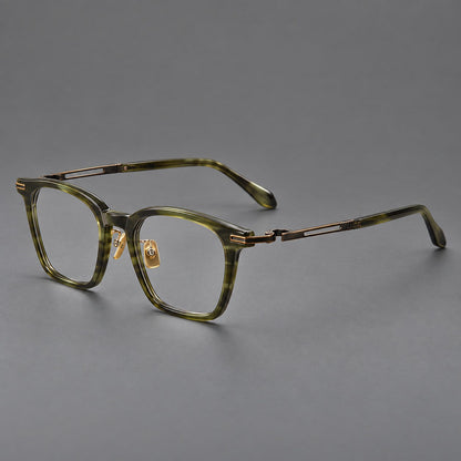 Acetate and titanium eyeglasses with rounded rectangular rims and sculpted open loop joints in Clear Olive Green / Antique Bronze, three quarter view additional product view