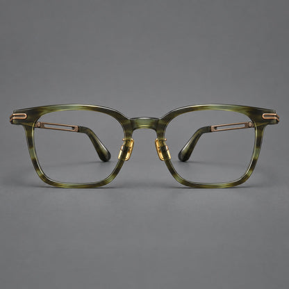 Acetate and titanium eyeglasses with rounded rectangular rims and sculpted open loop joints in Clear Olive Green / Antique Bronze, front view additional product view