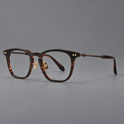 Retro acetate and titanium eyeglasses with gently squared rims and circular metal hinges in Striped Dark Brown / Antique Bronze, three quarter view