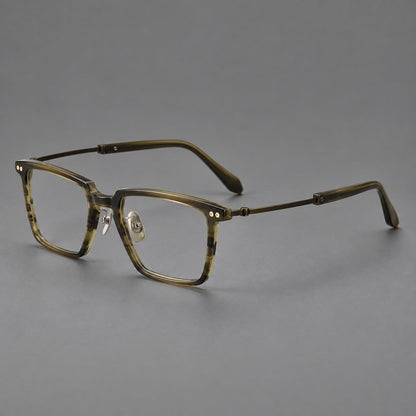 Classic acetate and titanium eyeglasses with a straight brow and rounded rectangular rims in Striped Olive Green / Bronze, three quarter view front view