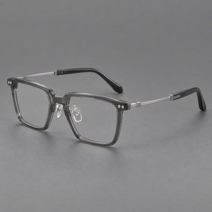 Classic acetate and titanium eyeglasses with a straight brow and rounded rectangular rims in Clear Gray / Silver, three quarter view additional product view