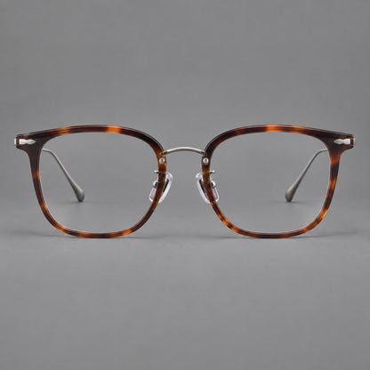 Retro square eyeglasses in acetate and titanium with rounded edges and sculpted corner accents in Tortoiseshell / Antique Copper, front view side view