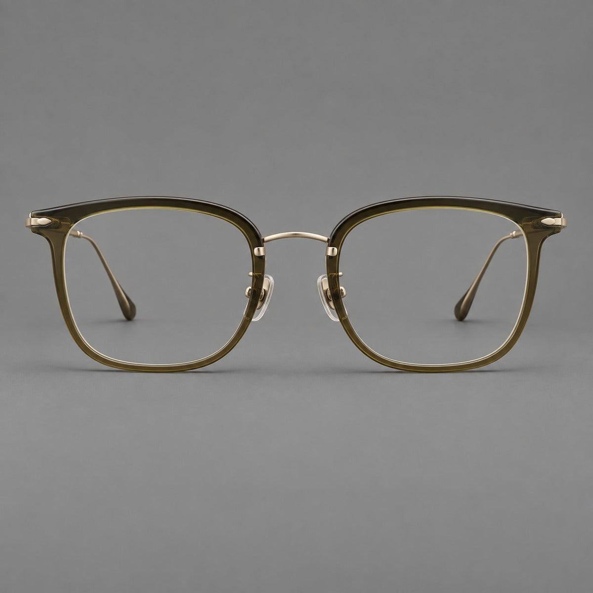 Retro square eyeglasses in acetate and titanium with rounded edges and sculpted corner accents in Green / Antique Bronze, front view