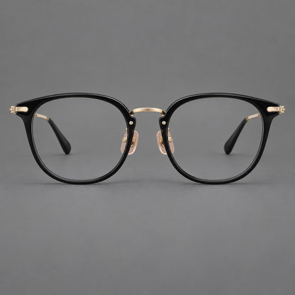 Classic soft square eyeglasses in acetate and titanium with engraved temples and corner accents in Glossy Black / Gold, front view additional product view