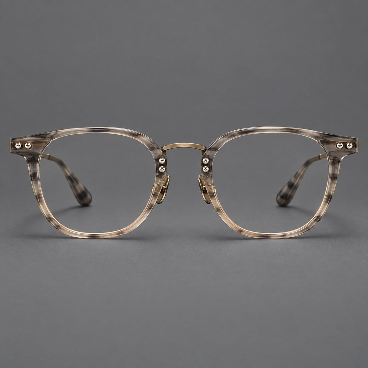 Retro acetate and titanium eyeglasses with softly rounded rims and a metal bridge in Light Gray Woodgrain, front view
