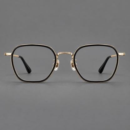Soft square eyeglasses in acetate and titanium with slim rims and a finely engraved metal bridge in Glossy Black / Gold, front view temple detail