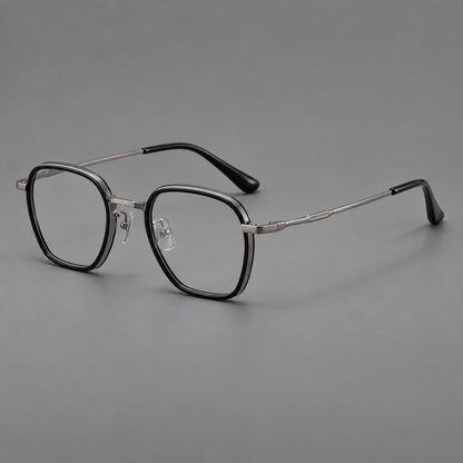 Soft square eyeglasses in acetate and titanium with slim rims and a finely engraved metal bridge in Glossy Black / Gunmetal, three quarter view additional product view