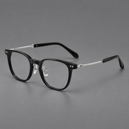 Vintage acetate and titanium eyeglasses with soft square rims and paired metal rivets in Black / Silver, three quarter view front view