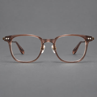 Vintage acetate and titanium eyeglasses with soft square rims and paired metal rivets in Clear Brown / Antique Bronze, front view additional product view