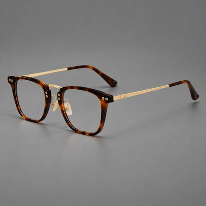 Acetate and titanium eyeglasses with soft square rims and an arched metal bridge in Tortoiseshell / Gold, three quarter view
