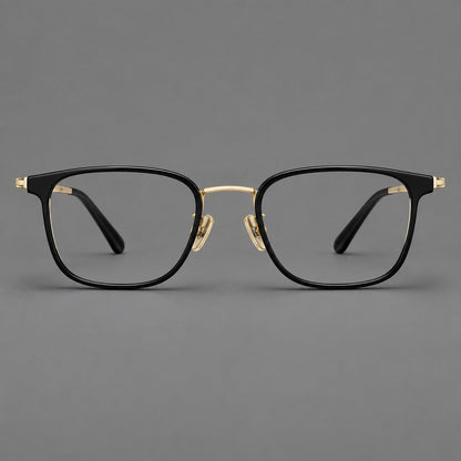 Rounded rectangular eyeglasses in acetate and titanium with bold corners and engraved metal temples in Glossy Black / Gold, front view temple detail
