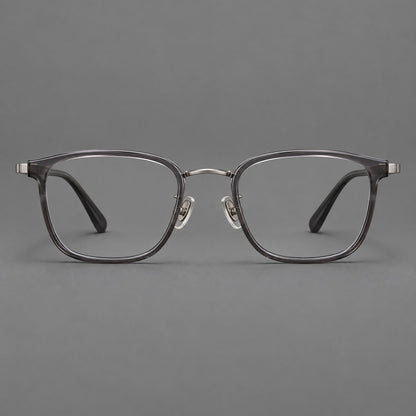 Rounded rectangular eyeglasses in acetate and titanium with bold corners and engraved metal temples in Clear Gray / Gunmetal, front view additional product view
