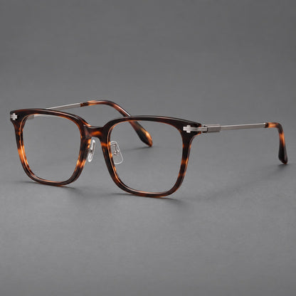 Classic acetate and titanium eyeglasses with broad square rims and textured metal temples in Tortoiseshell / Gray, three quarter view