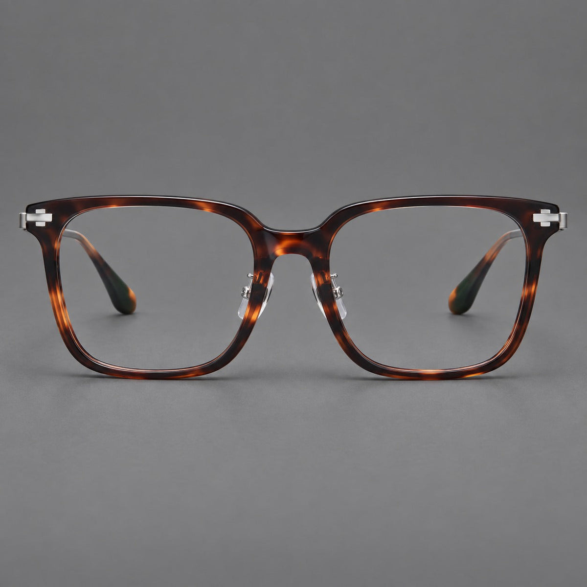 Classic acetate and titanium eyeglasses with broad square rims and textured metal temples in Tortoiseshell / Gray, front view