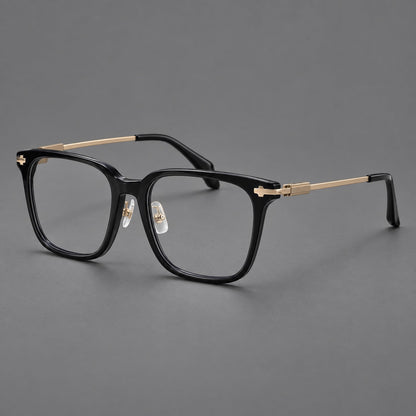 Classic acetate and titanium eyeglasses with broad square rims and textured metal temples in Black / Gold, three quarter view front view