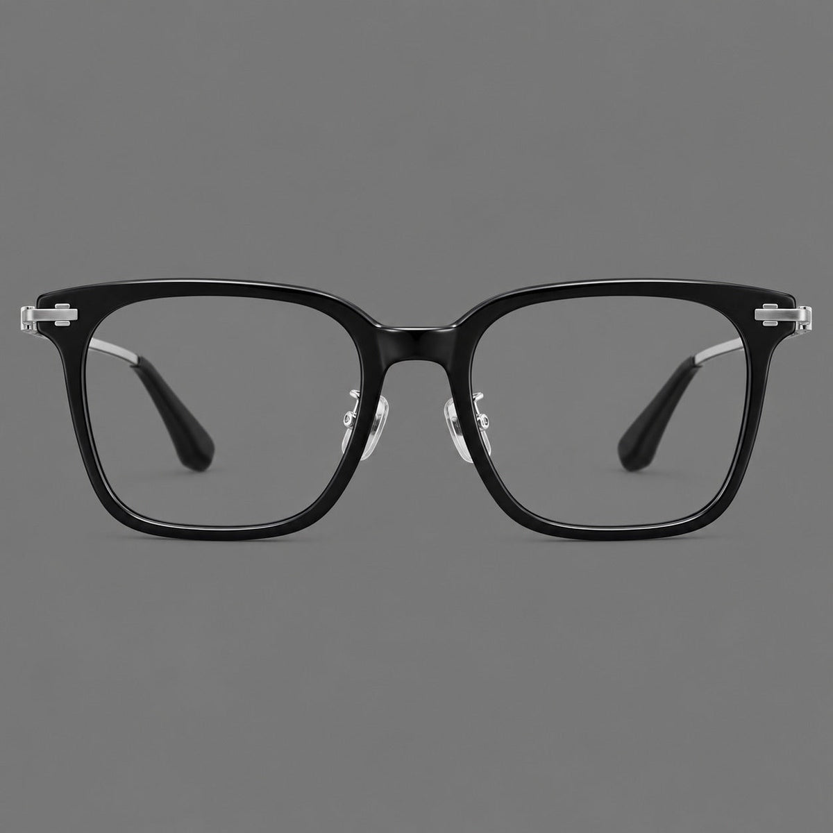 Classic acetate and titanium eyeglasses with broad square rims and textured metal temples in Black / Silver, front view