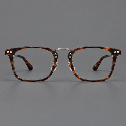 Acetate and titanium eyeglasses with angular rectangular rims and a curved metal bridge in Tortoiseshell / Gunmetal, front view side view