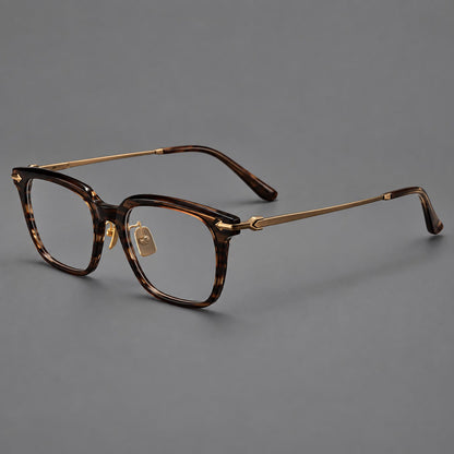 Bold acetate and titanium eyeglasses with rectangular rims and sculpted arrow accents in Tea Woodgrain / Antique Bronze, three quarter view front view