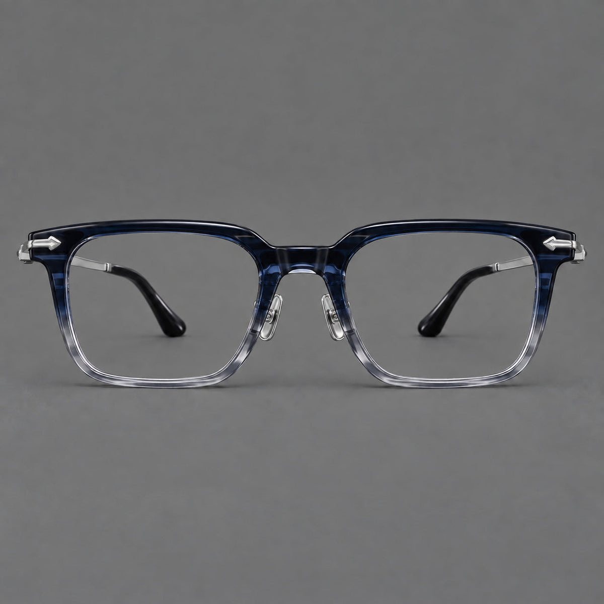 Bold acetate and titanium eyeglasses with rectangular rims and sculpted arrow accents in Blue Gradient / Silver Gray, front view