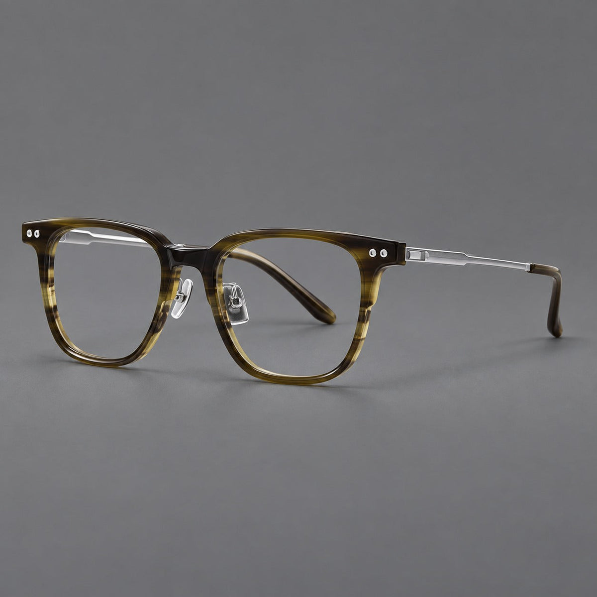 Classic acetate and titanium eyeglasses with squared brows and paired corner rivets in Olive Woodgrain / Silver, three quarter view
