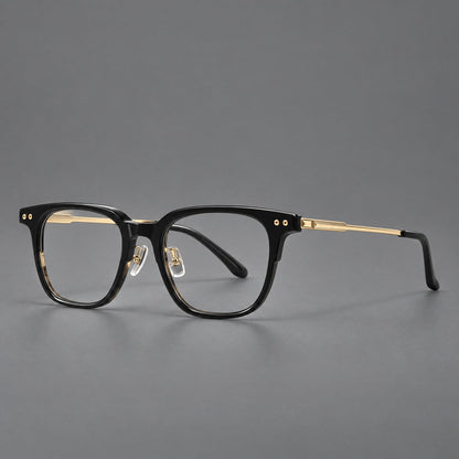 Classic acetate and titanium eyeglasses with squared brows and paired corner rivets in Black / Gold, three quarter view lens detail