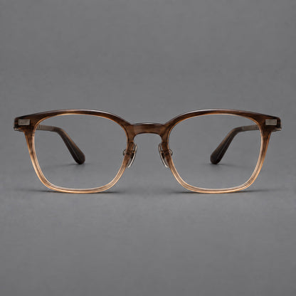 Classic acetate and titanium eyeglasses with rounded square rims and textured corner accents in Brown Gradient / Antique Bronze, front view frame detail