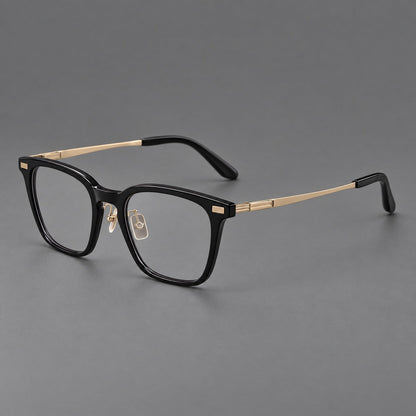 Classic acetate and titanium eyeglasses with rounded square rims and textured corner accents in Black / Gold, three quarter view lens detail