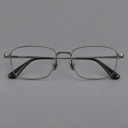 Modern square titanium glasses with an angular bridge and broad straight temples in Gunmetal, front view frame detail
