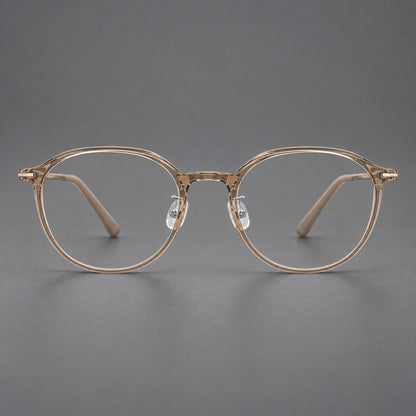 Retro round plastic eyeglasses with a curved bridge and slim metal corner accents in Tea, front view temple detail