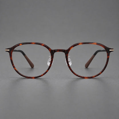 Retro round plastic eyeglasses with a curved bridge and slim metal corner accents in Tortoiseshell, front view additional product view