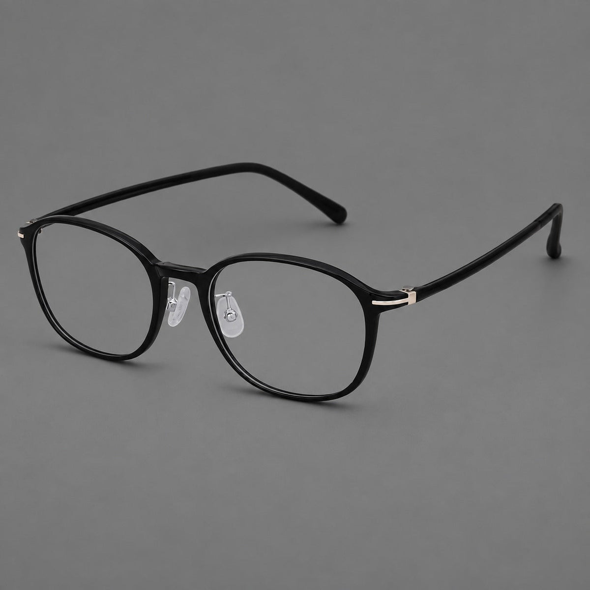 Soft square plastic eyeglasses with a raised browline and rounded lower corners in Glossy Black, three quarter view